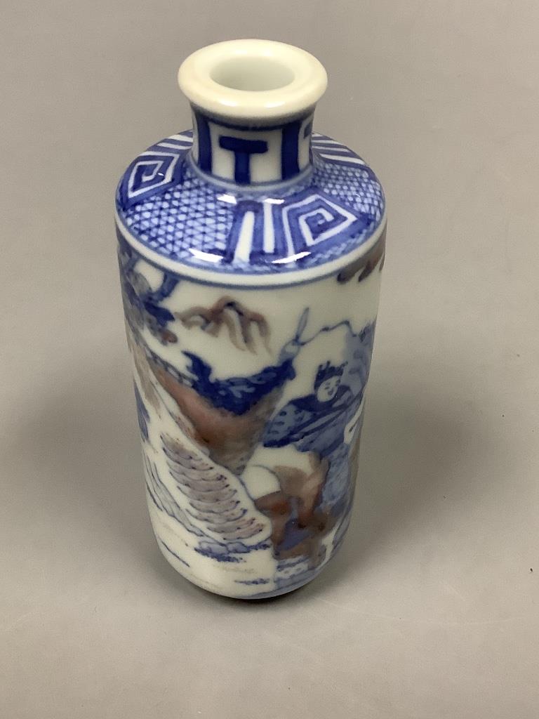 A Chinese underglaze blue and copper red snuff bottle, height 11.5cm